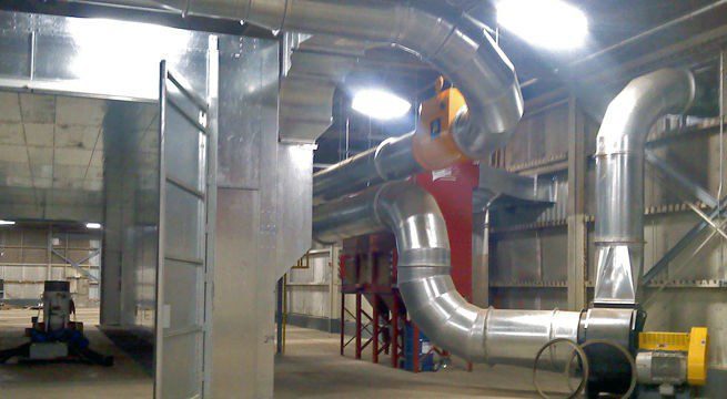 RP8-4, 32 cartridge collector, equipped with remote mount fan, explosion vents and passive damper